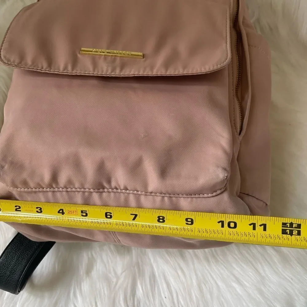 Steve Madden Nylon blush pink backpack with black embroidery back straps.